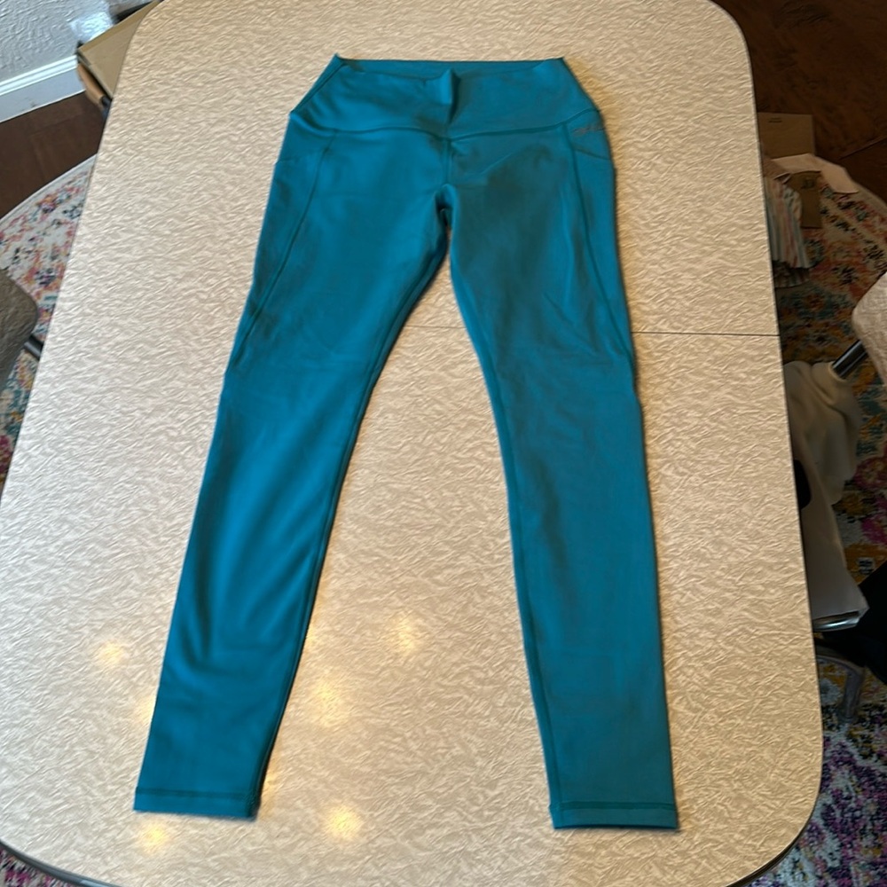 DHVANI Terra Legging. Teal. Size Large. New without tags.